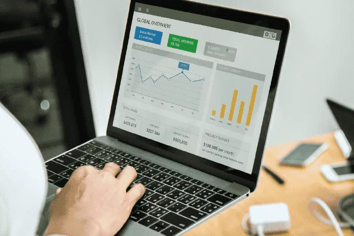 A business owner reviewing receipts to determine allowable expenses