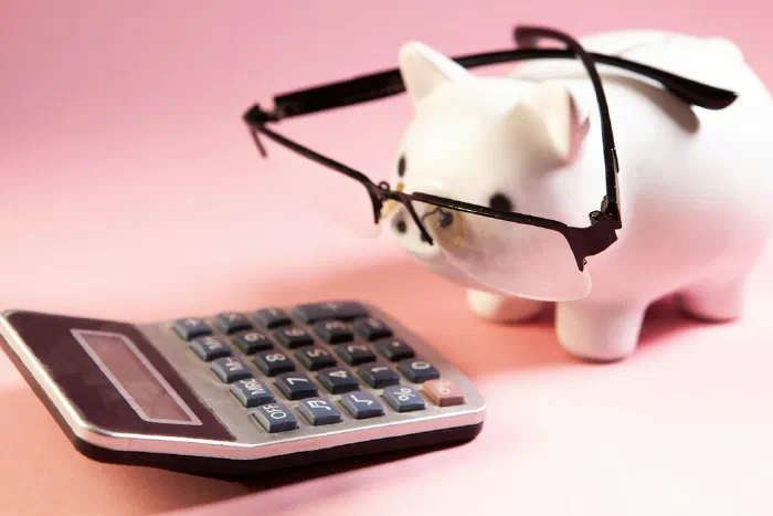 A self-employed person reviewing retirement savings and pension paperwork
