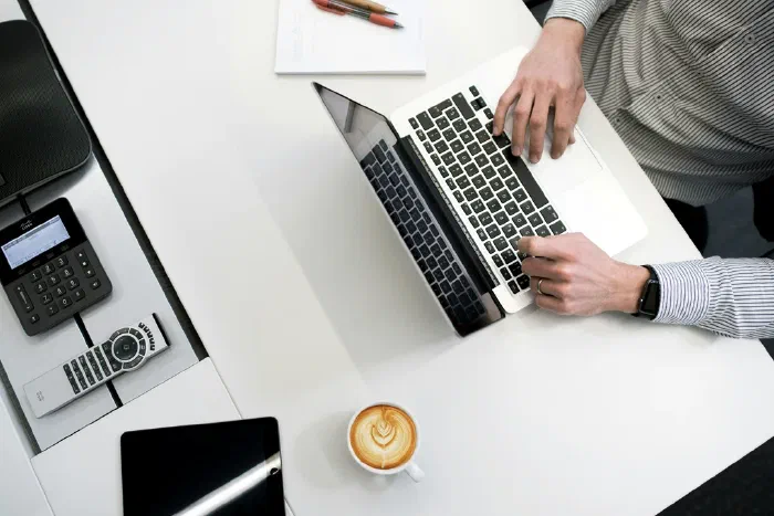 A sole trader reviewing tax calculations and calendar deadlines