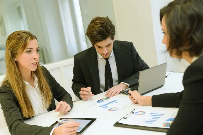 A business owner comparing paperwork for sole trader and limited company structures