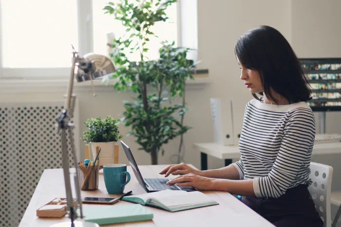 A business owner deciding between hiring a bookkeeper or accountant